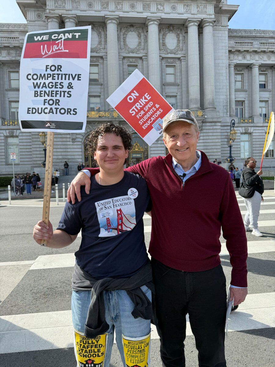 WE CAN'T
Wait
FOR
COMPETITIVE
WAGES &
BENEFITS
FOR
EDUCATORS

ON
STRIKE
UESF
FOR FAIR
PAY &
STUDENT &
EDUCATORS

UNITED EDUCATORS
OF SAN FRANCISCO

[Text on boot covers appears to reference school funding but is partially obscured]